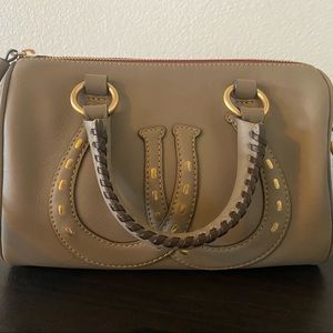 Like new Dooney and Bourke horseshoe barrel bag